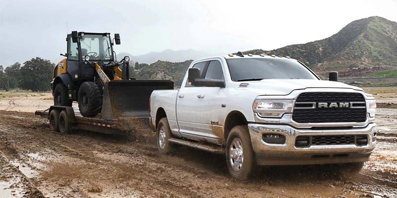 2024 Ram 2500 towing heavy equipment